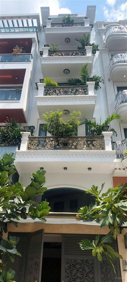 Siêu phẩm tòa nhà 6 tầng 81m2 xe hơi đổ cửa, có thang máy vào ở ngay gần chợ an nhơn gò vấp