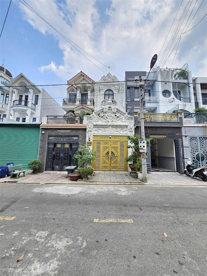 Bán nhà 1 trệt 2 lầu kdc, gần đường lê hồng phong tp.dĩ an, có gara ô tô, pn dưới chỉ 5ty1 tl