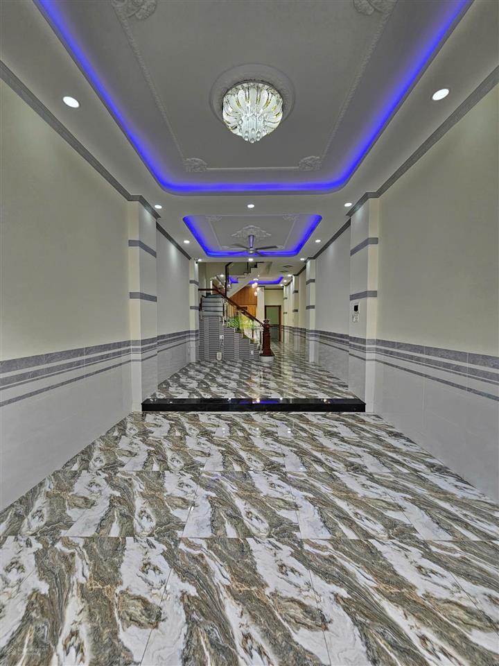 Bán nhà 1 trệt 2 lầu kdc, gần đường lê hồng phong tp.dĩ an, có gara ô tô, pn dưới chỉ 5ty1 tl