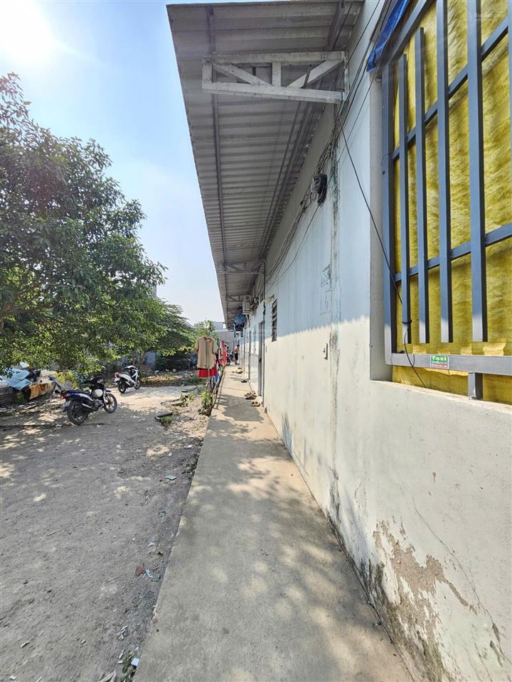 Bán nhà 1 trệt lầu, 6 phòng sau, gần ngã tư chiêu liêu thu nhập 15tr/tháng