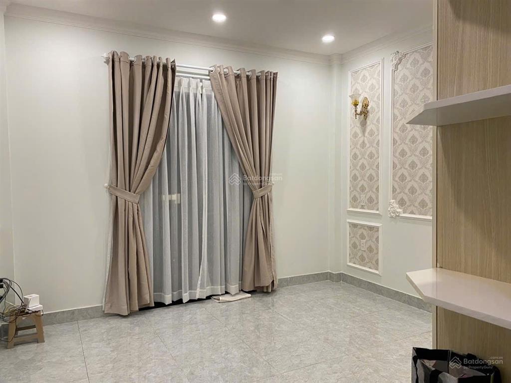 Nhà trệt, lửng, 2lầu đúc, sân thượng. dt4x15m=7,1tỷ. phạm văn chiêu gv.