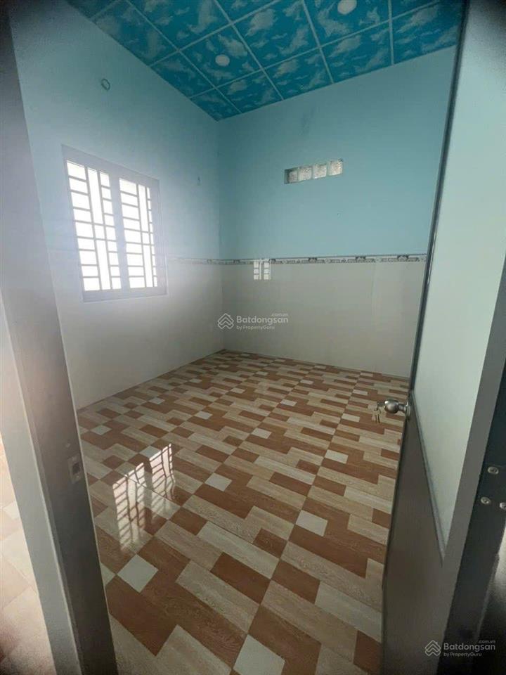 Bán nhà cấp 4 sân ô tô 2 phòng ngủ mặt tiền dx 22 tân định (cũ)