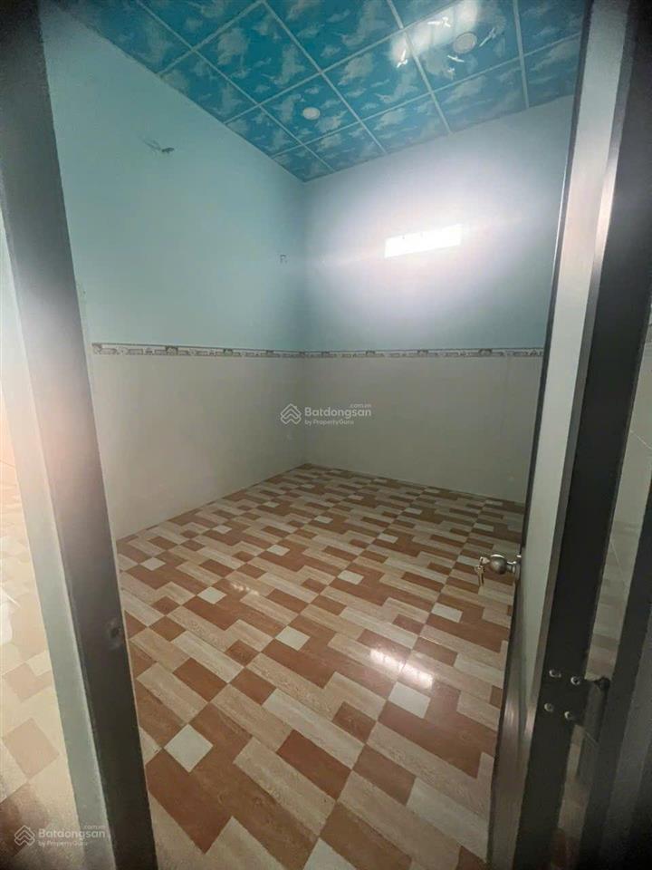 Bán nhà cấp 4 sân ô tô 2 phòng ngủ mặt tiền dx 22 tân định (cũ)
