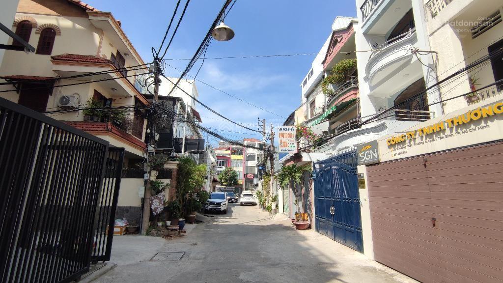 Hẻm 1 hoàng việt xe hơi ngủ trong nhà, khu vip tân bình, 68m2 , 6 pn, xây 4 tầng còn mới đẹp