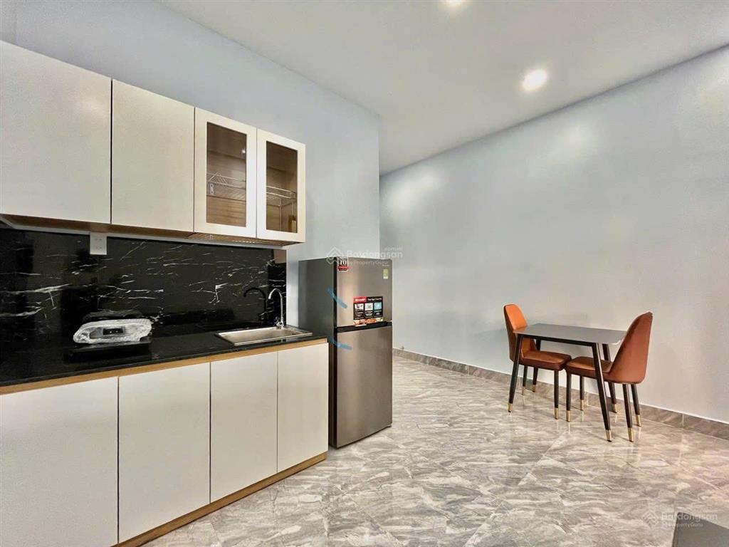 Căn hộ 1 phòng ngủ 45m lê quang định bình thạnh cửa sổ lớn, bếp riêng, thang máy ở gần quận 1