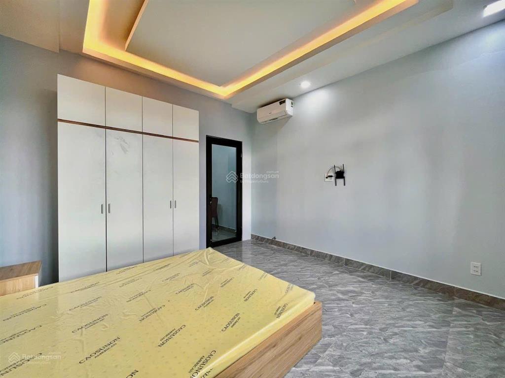 Căn hộ 1 phòng ngủ 45m lê quang định bình thạnh cửa sổ lớn, bếp riêng, thang máy ở gần quận 1