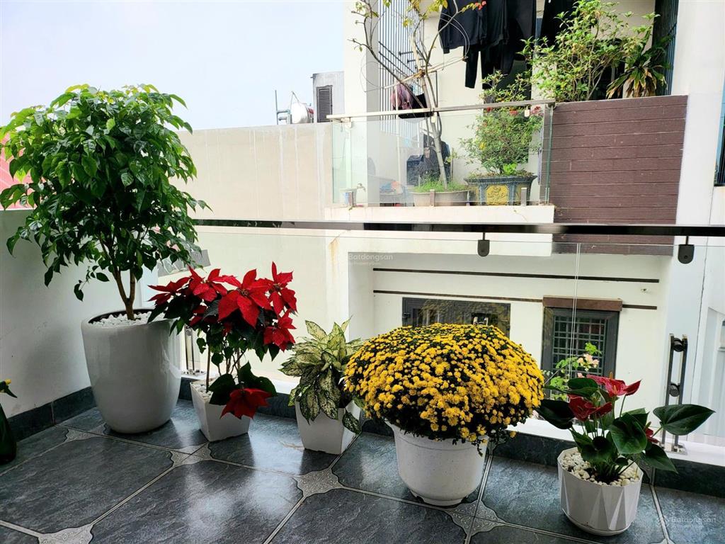 8.3tỷ 40m2 6 tầng thang máy tk hiện đại ô tô đỗ cửa 30m mặt phố ngô xuân quảng