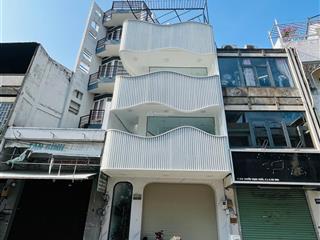 Mặt tiền nguyễn trọng tuyển vòng xoay lê văn sỹ nhà mới 100%