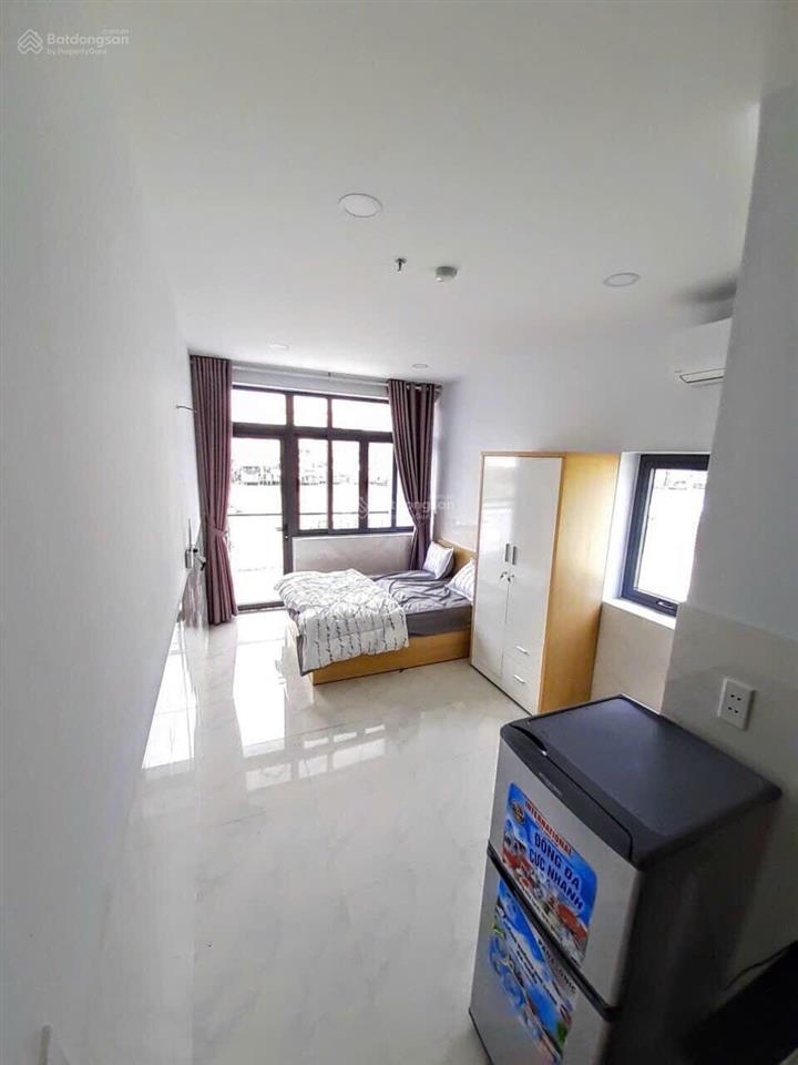 Cho thuê studio tách bếp ngay cầu nguyễn văn cừ  ban công, full nội thất