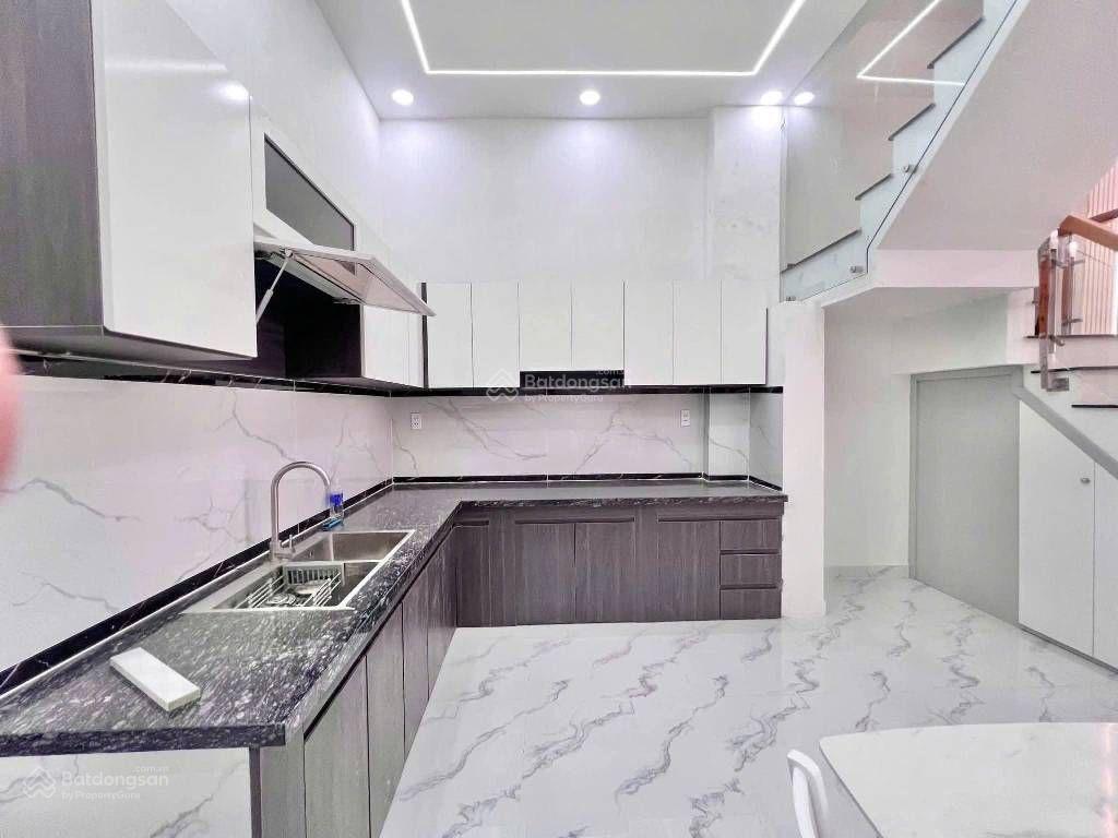 Nhà 2 tầng đông hưng thuận q12  sát nguyễn văn quá  hẻm xe hơi  4 x 12