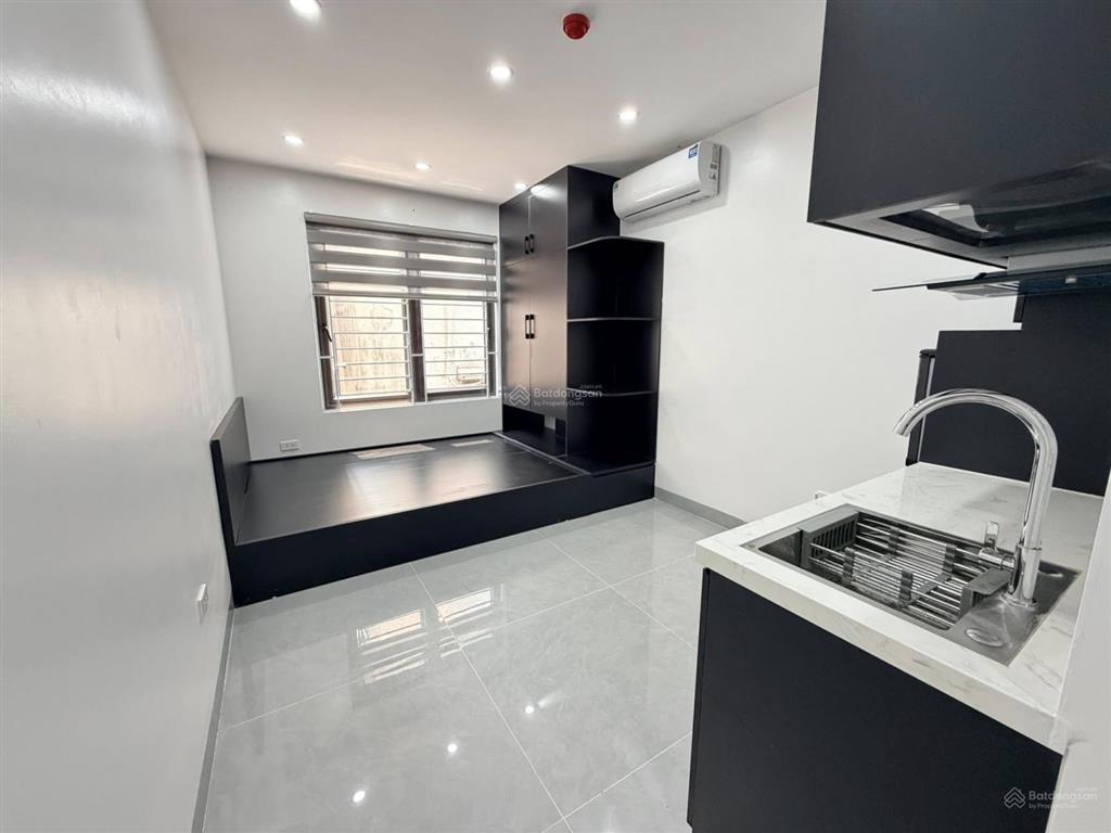 31, bán ccmn trần cung  2 mặt ngõ  7 tầng  thang máy  20 pkk  dòng tiền ổn định