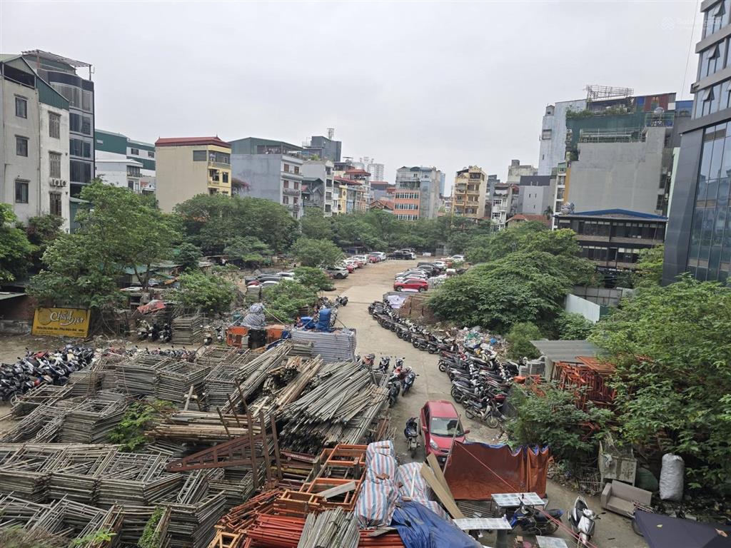 56, bán nhà nguyễn chánh  2 mặt thoáng  ngõ ô tô tránh  vỉa hè rộng  kinh doanh sầm uất