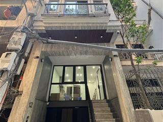 Bán ccmn phùng chí kiên  10 tầng thang máy  ô tô đỗ cửa  15 căn hộ + 1 sàn spa  ngõ thông