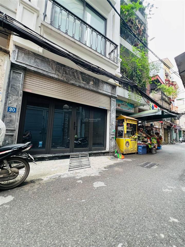 Bán nhà khúc thừa dụ  7 tầng thang máy  ngõ thông  ô tô vào nhà