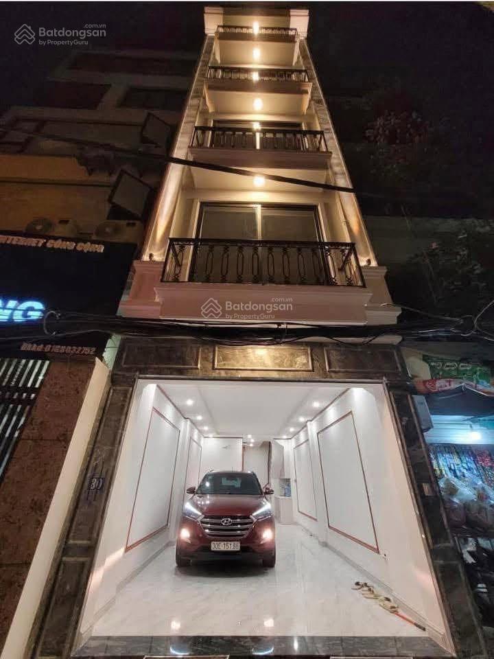 Bán nhà khúc thừa dụ  7 tầng thang máy  ngõ thông  ô tô vào nhà