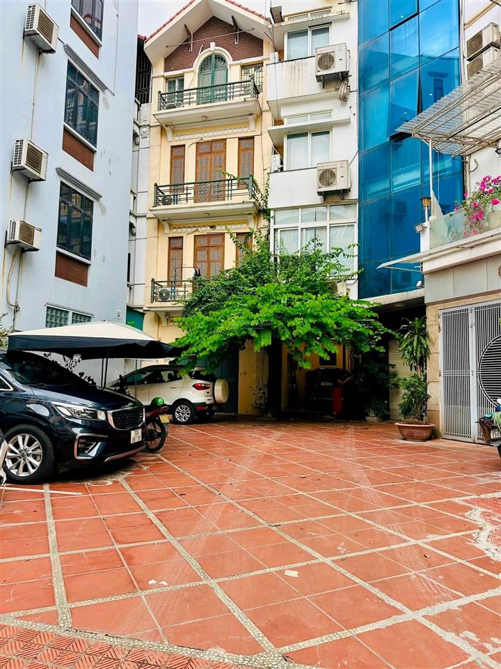 Bán nhà nguyễn khánh toàn  8 tầng thang máy  lô góc  2 mặt ngõ  ô tô tránh  view thoáng