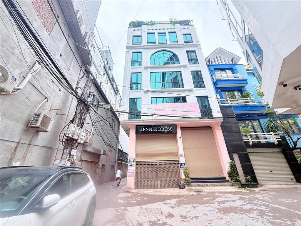Bán nhà nguyễn khang  7 tầng  lô góc 2 mặt thoáng  ô tô vào nhà  ngõ thông