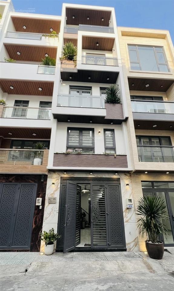 Bán nhà 4 tầng đẹp lung linh  gần chợ tân hương ( tân phú )  dt 4 x 18m  đường 8m  giá chỉ