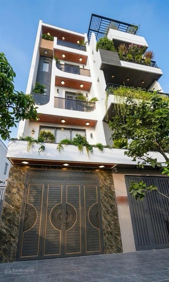 Bán nhà 5 tầng  gần lê văn quới (bình tân) giáp tân phú  dt 4 x 14m  đường 7m thông thoáng  g
