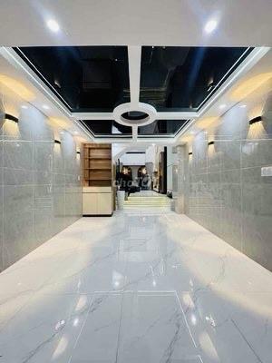 Lê văn quới ( bình tân )  nhà 5 tầng đẹp như ngọc trinh  dt 4 x 16m ( 64m2 )  đường nhựa 8m  gi