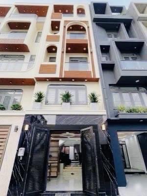 Lê văn quới ( bình tân )  nhà 5 tầng đẹp như ngọc trinh  dt 4 x 16m ( 64m2 )  đường nhựa 8m  gi