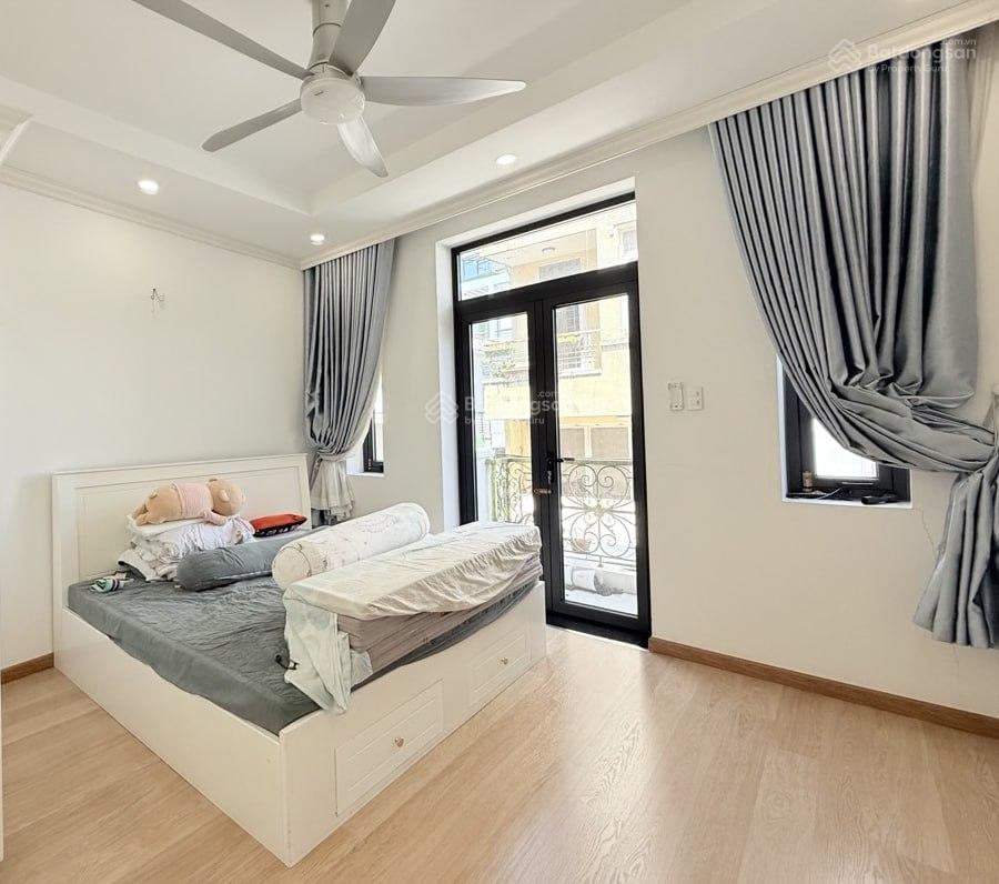 Gấp bán nhà 4 tầng, gần hẻm xe hơi phan văn trị  hẻm thông chu văn an, 4pn, dt 60m2. giá 8 tỷ tl