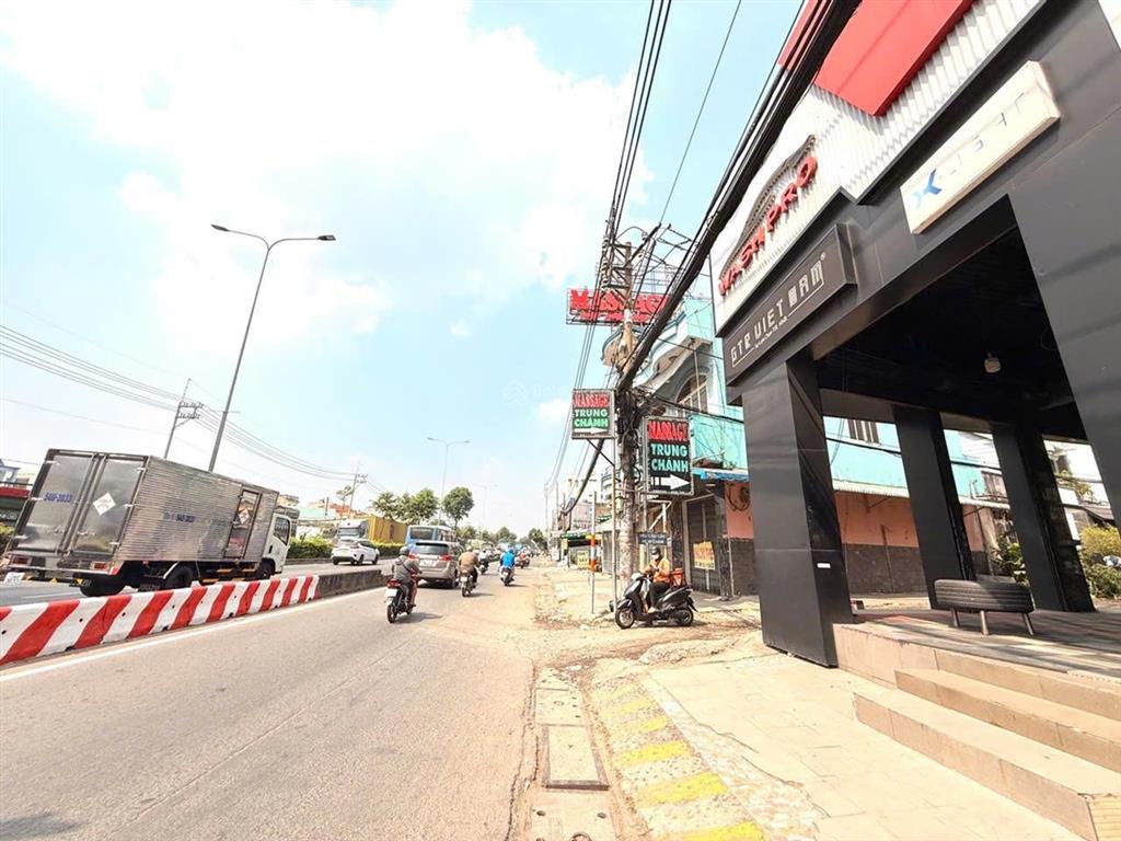 Bán nhà mặt tiền quốc lộ 22, trệt 4 lầu btct, kqhlg