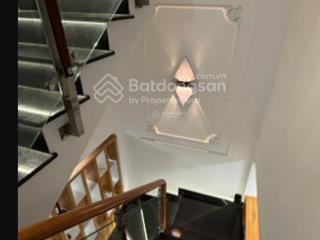 Nhà sổ đỏ xây mới 100% diện tích (4.1x13,57m) 55.6m2 xây full đất. 1 trệt 1 lửng 3 lầu + 1 tum