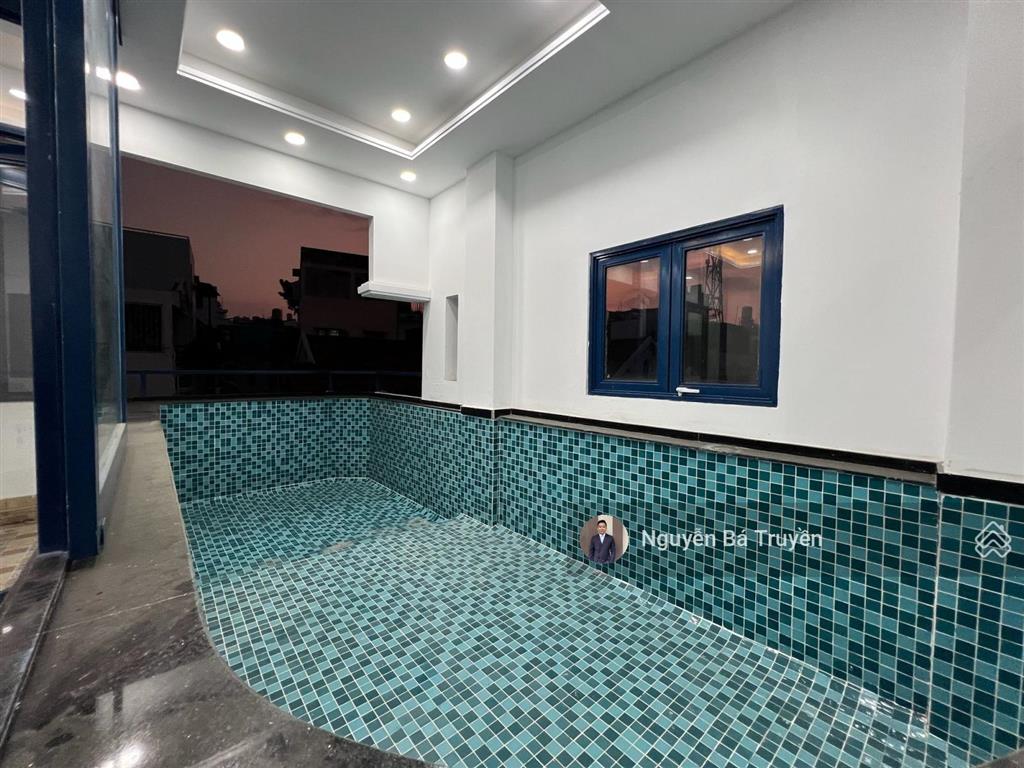 Bán nhà ngay đường nguyễn văn trỗitrần hữu trang quận phú nhuận. ngang 6m 5tầng thang máy full mới
