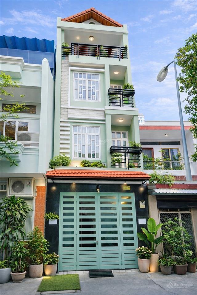 Bán nhà mt đường số quận 4 40x4x4 tầng xe hơi thả cửa giá nhỉnh 11 tỷ