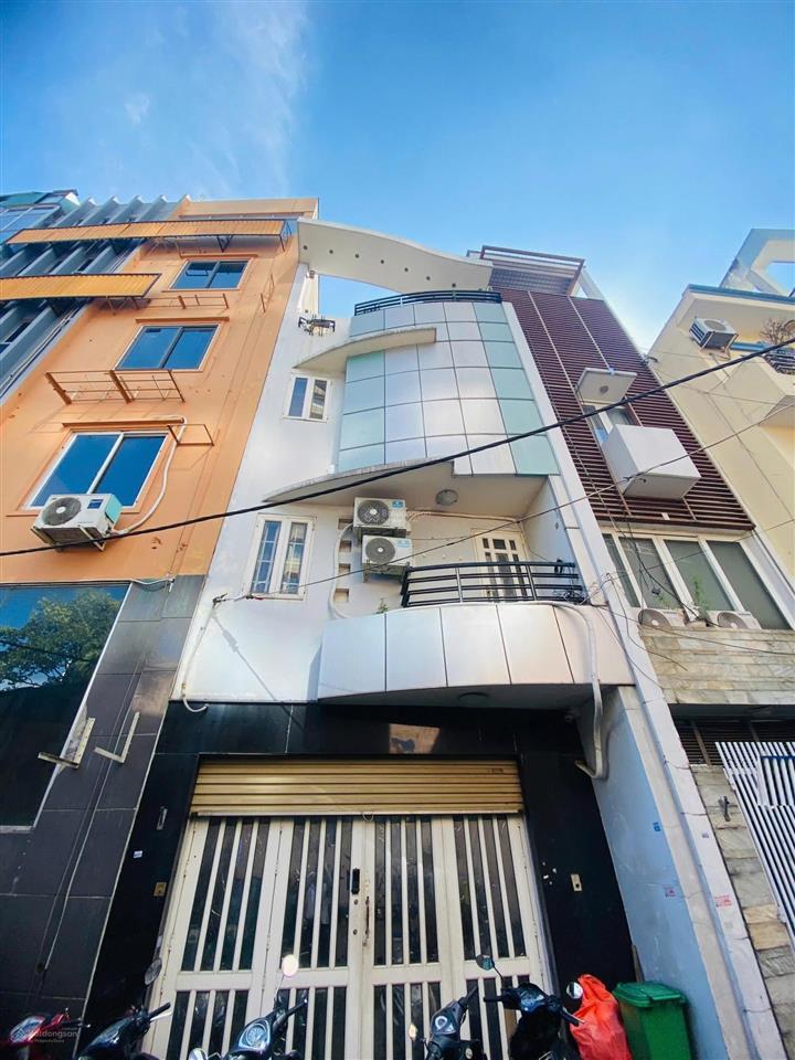 Bán nhà trần hưng đạo q.5  hxh 6m  chỉ sau 1 căn mặt tiền  dt 5m x 10m  4 tầng 4 btct