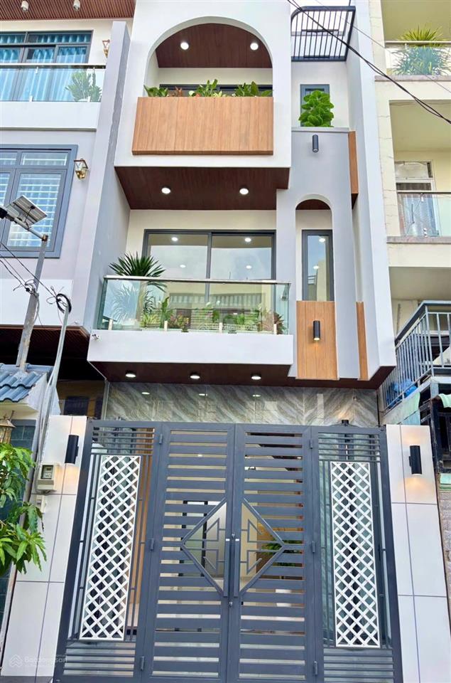 Bán nhà mới thiết kế hiện đại sang trọng kế bên chợ long trường q9