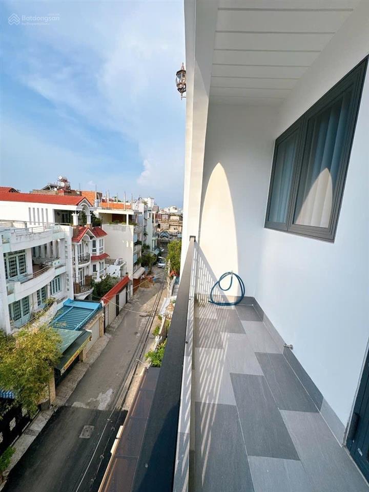 Hẻm nhựa 8m  lê quang định  5 tầng 7pn  khai thác 10 chdv  19.99 tỷ