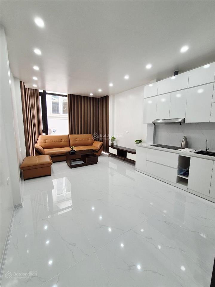 Tôn đức thắng  5 tầng thang máy  nhà đẹp long lanh  ô tô đỗ cửa  ngõ thông  kinh doanh.