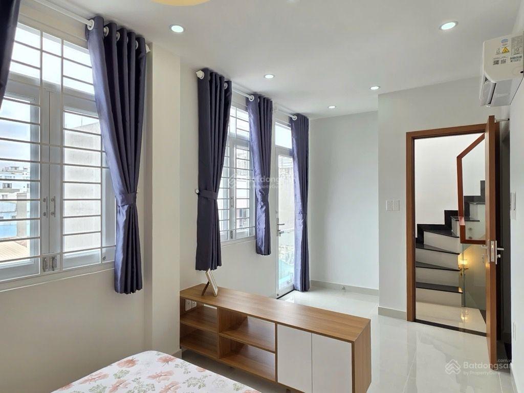 Sát xe tải  phần văn trị p12 bình thạnh  5 tầng  30 m2  4 pn  5,95 tỷ  nhà xây mới