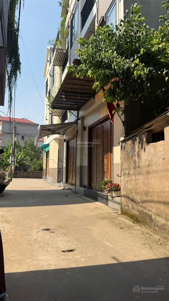 Bán nhà 3 tầng 33m2 kiên cố  ô tô vào đất  20m trục chính quang minh