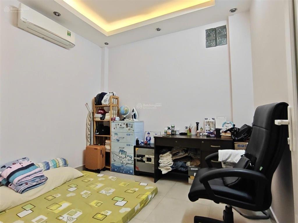 Nhà 4 tầng btct đường huỳnh văn bánh  trung tâm phú nhuận hẻm rộng sổ vuông a4 không lộ giới