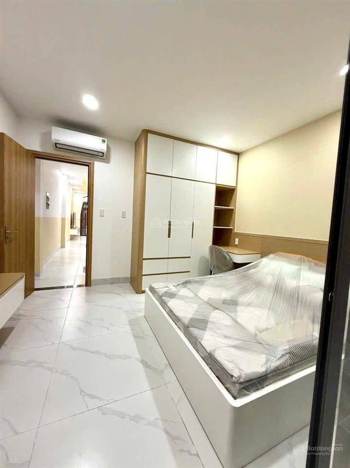 Một trệt 2 lầu, đường thới an 20q12 dt 87m, ngang 4 dài 22 m, sân thượng trước sau, sổ hồng riêng.