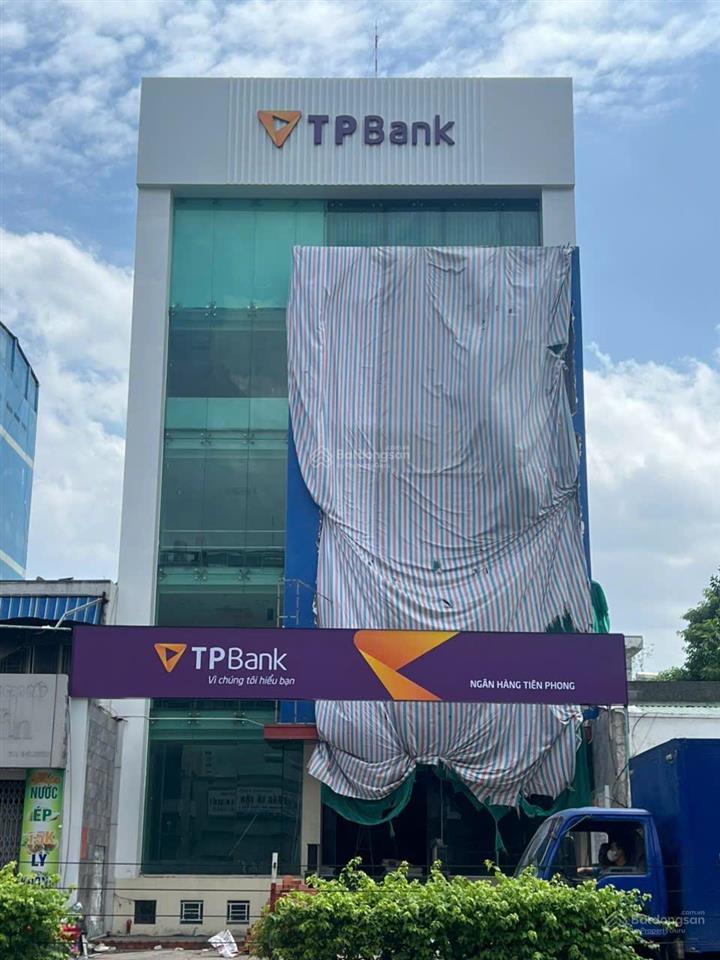 Tòa nhà mặt tiền 12m ngay phan đăng lưu, pn  dts 1550m2  hầm 8 tầng  tn 320 tr/th  giá 75 tỷ