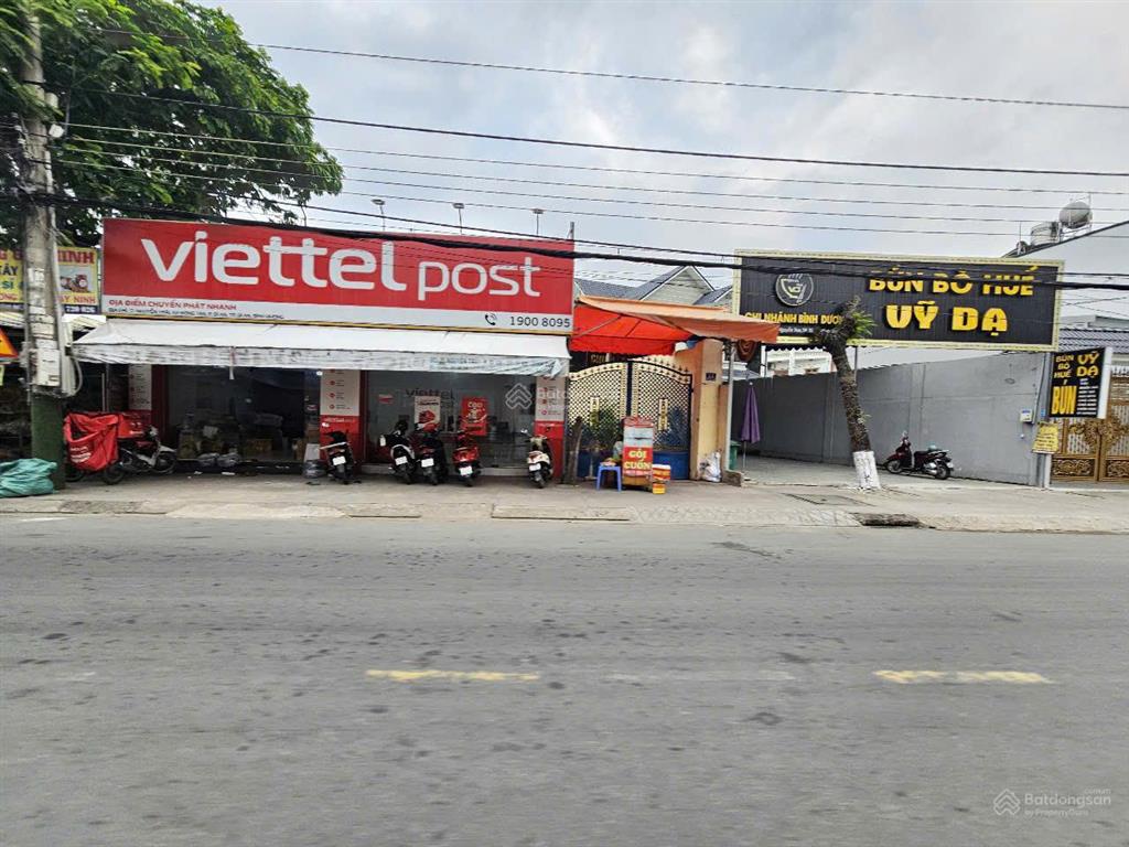 Nhà mặt tiền 246m2 đường 8m đường nguyễn trãi gần chợ xóm vắng tp dĩ an