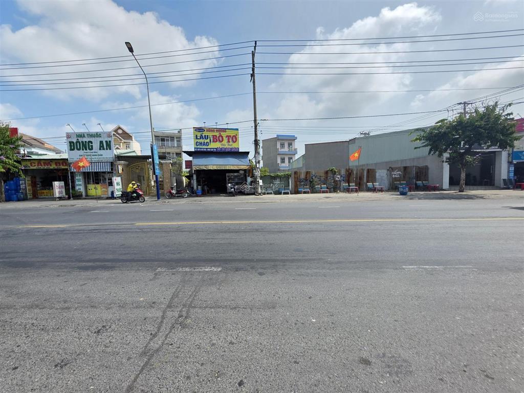 Đất 718m ngang 15m mặt tiền đt 743b gần ngã tư bình thung, phường tân đông hiệp, tp dĩ an.