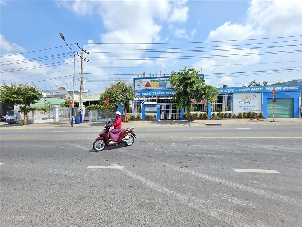 Đất 718m ngang 15m mặt tiền đt 743b gần ngã tư bình thung, phường tân đông hiệp, tp dĩ an.