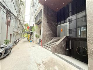 32 phòng tòa nhà dòng tiền gần hồ chùa láng  dt 110m cao 10 tầng 2 mặt ngõ oto  dthu 3 tỷ/năm