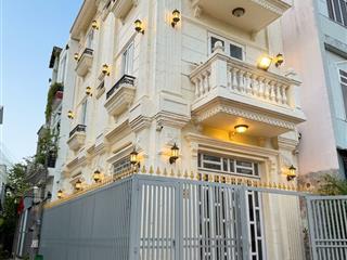 Bán nhà quận 7 đường huỳnh tấn phát dt 5m x 12m 4 lầu 5 pn hẻm 14m 2 xe 7 chỗ đỗ trong nhà