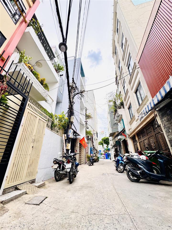Quận 3 chủ 1 đời xưa bán nhà 4 tầng mặt tiền hxh võ văn tần,p.bàn cờdt 82m24,2m*22m chỉ 18,2 tỷ