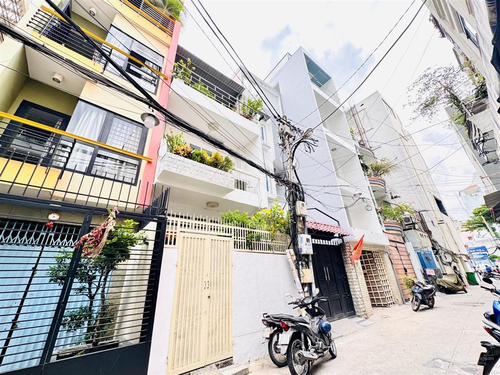 Quận 3 chủ 1 đời xưa bán nhà 4 tầng mặt tiền hxh võ văn tần,p.bàn cờdt 82m24,2m*22m chỉ 18,2 tỷ