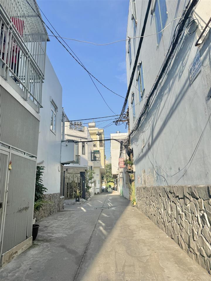 Q11. hẻm xe hơi thông  nhà 5 tầng  sát mặt tiền minh phụng  vuông vức