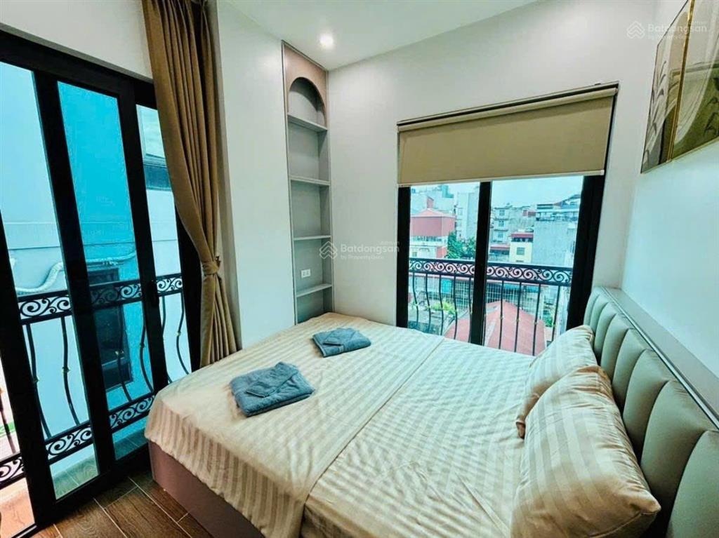 Hiếm đội cấn tt ba đình  kinh doanh đỉnh  tòa 70m2  8 tầng  mt 7m  lô góc  giá 33.5 tỷ tl