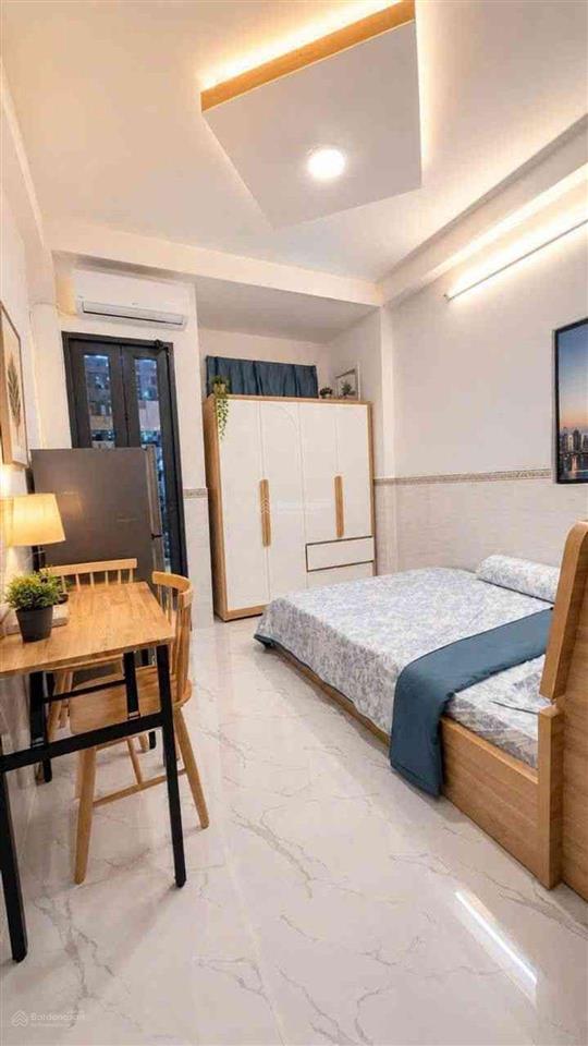 Cần bán căn hộ dịch vụ 5 tầng 9 phòng ngủ, 9 wc, hẻm 4m thông, gần trường âu dương lân, cầu chữ y