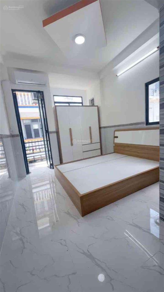 Cần bán căn hộ dịch vụ 5 tầng 9 phòng ngủ, 9 wc, hẻm 4m thông, gần trường âu dương lân, cầu chữ y